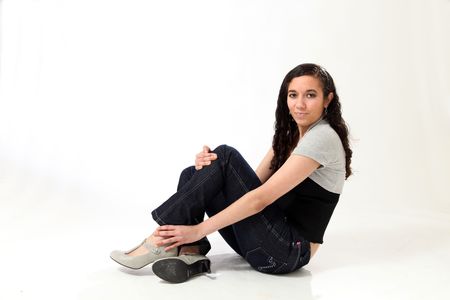 Beautiful Young Female Model in Isolated Studio Settingの写真素材