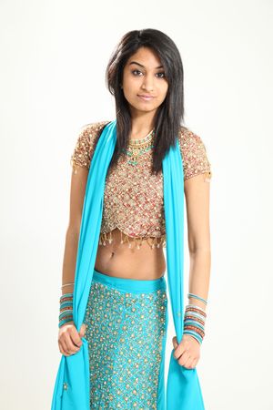 Beautiful Young Indian Female Model in Isolated Studio Settingの写真素材