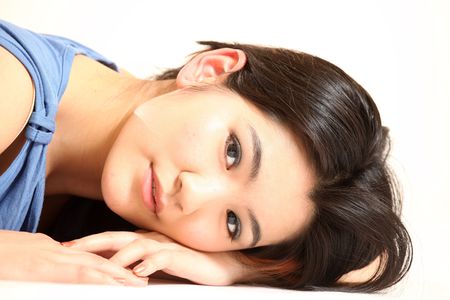 Beautiful Young Female Model in Isolated Studio Settingの写真素材