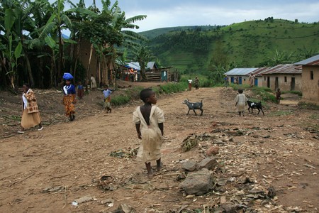 DR CONGO - NOV 2ND : Refugees cross from DR Congo into Uganda at the border village of Busanza in Kisoro district on 2nd November 2008のeditorial素材