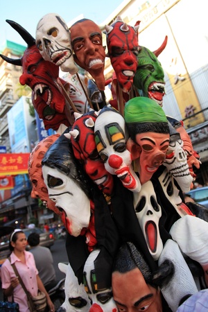BANGKOK - JANUARY 23 : Chinese New Year 2012 - Scary masks for sale in Chinatown, Bangkok, Thailandのeditorial素材