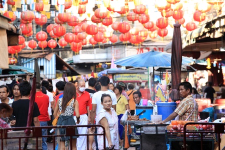 BANGKOK - JANUARY 23 : Chinese New Year 2012 - Busy streets and red lanterns in Chinatown, Bangkok, Thailand on 23rd January 2012のeditorial素材