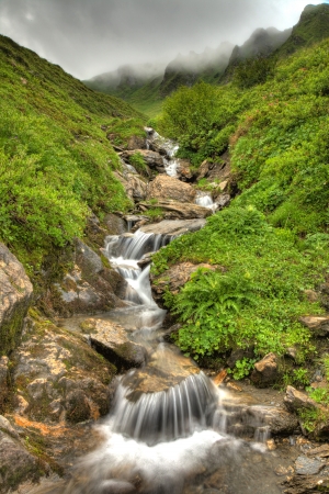 Fresh Waterfall from Mountain Spring, Alpsの写真素材