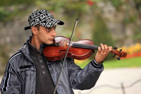 Violinist at Mirabell Gardens in Salzburg City in Austria, Europeのeditorial素材