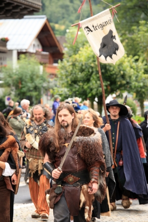 KAPRUN, AUSTRIA - JUL 22: The Castle festival on July 22, 2012, in Kaprun, Austria a Traditional annual festival in a region of The Alps Mountains.のeditorial素材