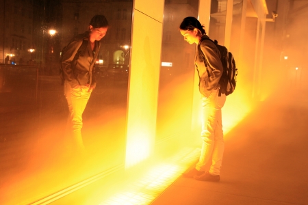 VIENNA - SEPT 23: Yellow Fog is an intervention by Danish-Icelandic artist Olafur Eliasson. Shown at the Verbund on September 23, 2012, in Vienna, Austria.のeditorial素材
