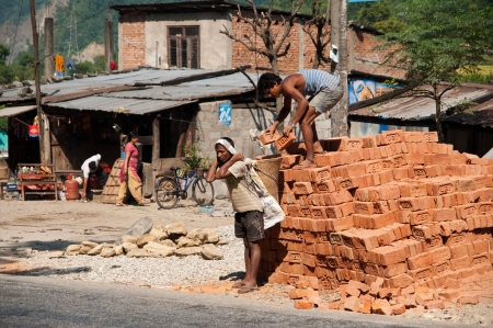 Workers on Construction Site WithBuilding Bricks in Nepalのeditorial素材