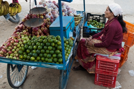 Woman selling fruit on the street in Nepalのeditorial素材