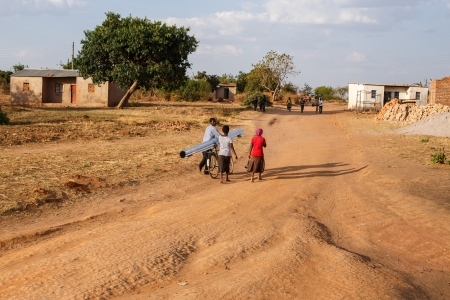 ZAMBIA - OCTOBER 14 2013: Local people go about day to day life in Zambia, Africaのeditorial素材