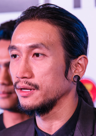 BANGKOK - FEBRUARY 19 2014: Toon (Athiwara Khongmalai) - Lead Singer of Bodyslam at MTV Exit Press Conference held in Central World Plaza Bangkok for upcoming charity concert in Udon Thai, Thailandのeditorial素材