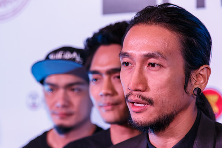 BANGKOK - FEBRUARY 19 2014: Toon (Athiwara Khongmalai) - Lead Singer of Bodyslam at MTV Exit Press Conference held in Central World Plaza Bangkok for upcoming charity concert in Udon Thai, Thailandのeditorial素材