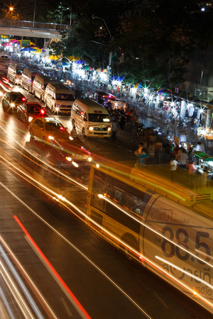 BANGKOK - FEBRUARY 22 2014: Entrance street to the world's largest weekend market Chatuchak which continues through protests in Bangkok, Thailandのeditorial素材