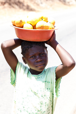 ZAMBIA - OCTOBER 14 2013: Local people go about day to day life in Zambia, Africaのeditorial素材