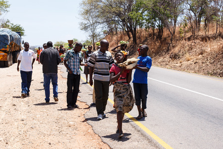 ZAMBIA - OCTOBER 14 2013: Local people go about day to day life in Zambia, Africaのeditorial素材