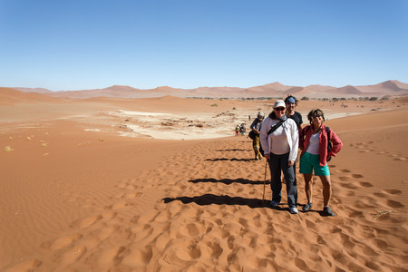 SOSSUSVLEI, NAMIBIA - NOVEMBER 2 2013: Tourists continue through the Namib Desert National Park in a year that was declared as a drought year by the government in Namibia, Africaのeditorial素材