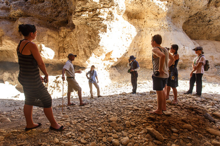SOSSUSVLEI, NAMIBIA - NOVEMBER 2 2013: Tourists explore Sesriem Canyon a Geological Feature in the Namib Desert during a year that was declared as a drought year by the government in Namibia, Africaのeditorial素材