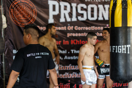 THAILAND - FEBUARY 11 2014: International fighters take part in warmup training for the upcoming Prison Fight round 6 competition in Khlong Phai Prison, Thailandのeditorial素材