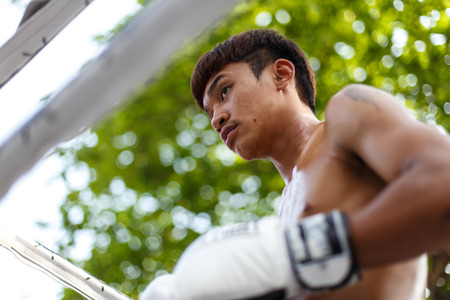 THAILAND - FEBUARY 13 2014: Prison fight / muay thai competition between international fighters and inmates within the walls of KhlongPai Prison, Thailandのeditorial素材