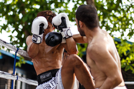 THAILAND - FEBUARY 13 2014: Prison fight / muay thai competition between international fighters and...