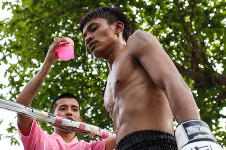 THAILAND - FEBUARY 13 2014: Prison fight / muay thai competition between international fighters and inmates within the walls of KhlongPai Prison, Thailandのeditorial素材