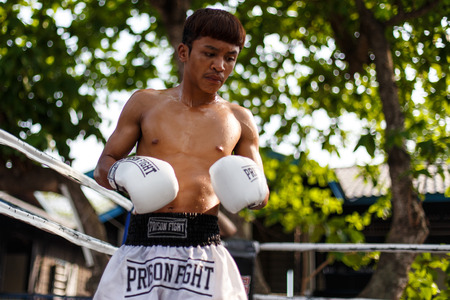 THAILAND - FEBUARY 13 2014: Prison fight / muay thai competition between international fighters and inmates within the walls of KhlongPai Prison, Thailandのeditorial素材