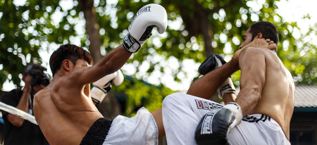 THAILAND - FEBUARY 13 2014: Prison fight / muay thai competition between international fighters and inmates within the walls of KhlongPai Prison, Thailandのeditorial素材