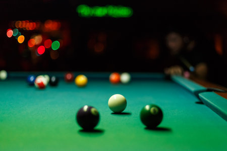Playing pool in a bar