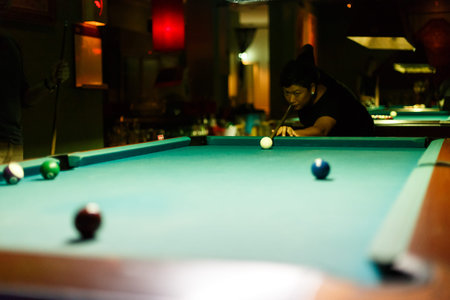 Playing pool in a bar