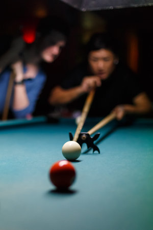 Playing pool in a bar
