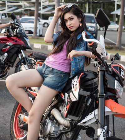Pretty Girl With Supermoto Dual Sport Motorbike