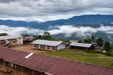 TEDIM, MYANMAR - JUNE 17 2015: Street life going on in the hill village of Tedim in recently opened to tourists Chin State, Myanmar (Burma).のeditorial素材