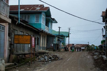 TEDIM, MYANMAR - JUNE 17 2015: Street life going on in the hill village of Tedim in recently opened to tourists Chin State, Myanmar (Burma).のeditorial素材