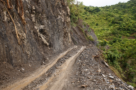 Dangerous Dirt Road Leading Through Chin State Mountainous Region, Myanmar (Burma)の写真素材