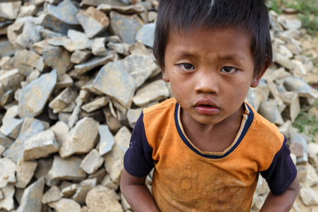 FALAM, MYANMAR - JUNE 17 2015: Local child in the recently opened to foreigners area of Chin State - western Myanmar (Burma)のeditorial素材
