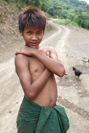 FALAM, MYANMAR - JUNE 17 2015: Local youth in the recently opened to foreigners area of Chin State - western Myanmar (Burma)のeditorial素材