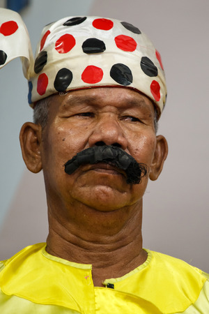 MANDALAY, MYANMAR - JUNE 25 2015: Moutache brother (Lu Zaw) performs a politically sensitive comedy show which has gaine recognition Mandalay, Myanmar.のeditorial素材
