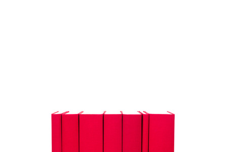 red hardcover books isolated on white backgroundの写真素材