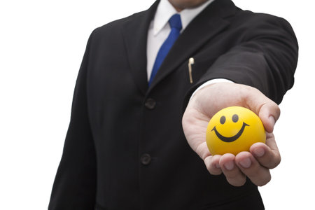 Business man give smily ball on white  Positive Theme 