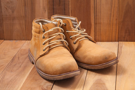 Casual Leather boots on wooden desk