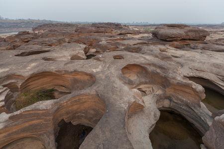 Rock holes Stone View Sam-Pan-Bok Grand Canyon in thailandの写真素材
