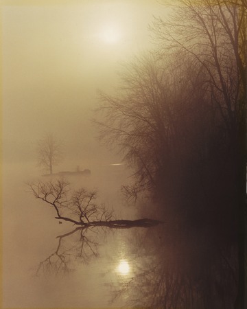 Foogy sunrise at Geist Reservoir near Indianapolis, Indiana.の写真素材