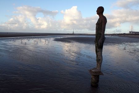 Antony Gormley's Another Place at Crosby Beachの写真素材