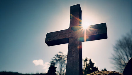 Cross on the grave. Cross on the background of the sun.の素材