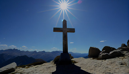 Cross on the summit of Pizol in Dolomites, Italyの素材
