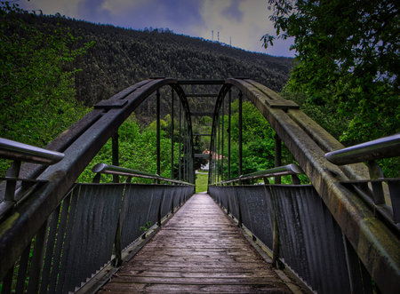 Iron bridge over the train tracks in Cantabria. Spain.の写真素材