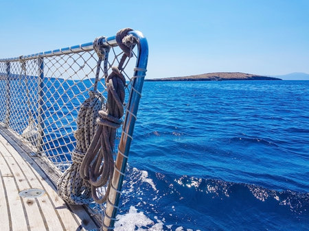blue sea view from deck of a sailboat