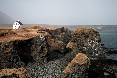 A house dangerously close to the sea on Snefellsnes, Iceland の写真素材