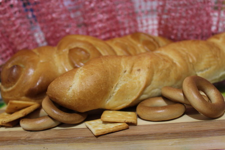 Bread, rolls and cookie, lying on a cook-tableの写真素材