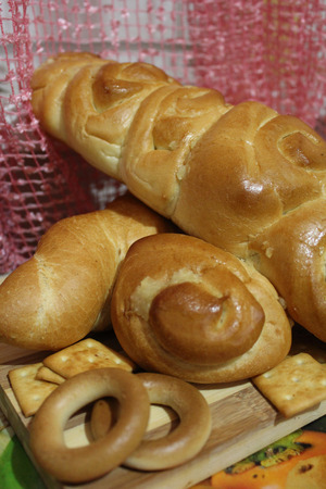 Bread, rolls and cookie, lying on a cook-tableの写真素材