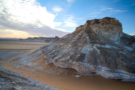 Late afternoon sun casting shadows in the Libyan desert white desert, Farafra, Egyptの写真素材